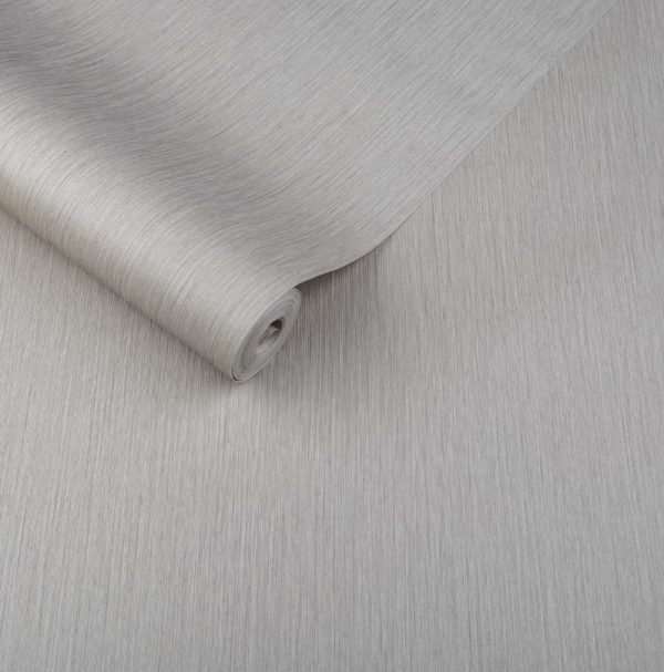 Es una imagen de un rollo de papel tapiz con rayas, colocado sobre una superficie blanca con paneles.