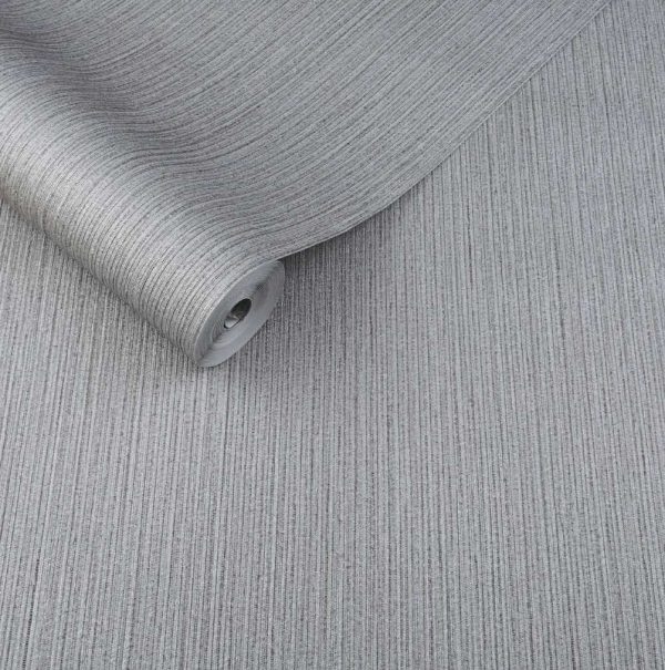 Es un papel de pared gris que está pegado sobre una superficie de color blanco.