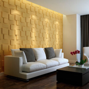 La imagen muestra una sala de estar que tiene una pared de color amarillo. Los muebles en esta sala tienen un estilo decorativo 3D Rubik, que significa que están diseñados con un patrón inspirado en el famoso cubo Rubik, añadiendo un aspecto tridimensional y contemporáneo a la habitación.